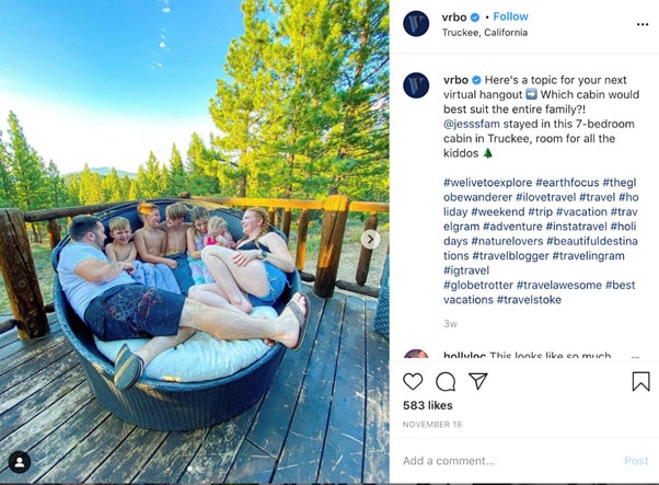 Screenshot of a vrbo Instagram post showing a family of two parents and five children sharing a large couch on vacation