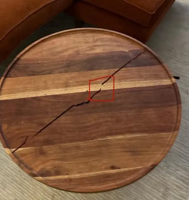 Image allegedly used in an Airbnb damage claim, showing a highlighted crack as evidence.

