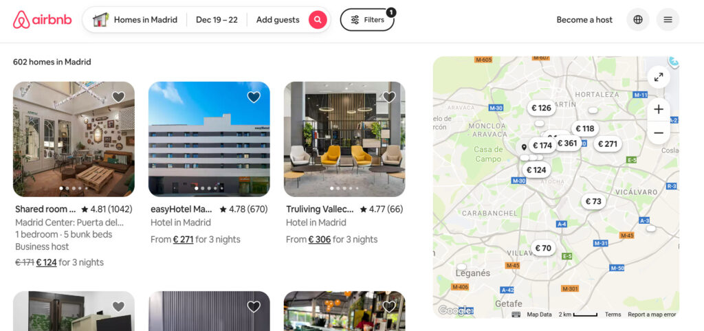 A screenshot of Airbnb’s search results for Madrid, showing hotels mixed with traditional STR listings. The page displays a split view: hotel cards on the left with room prices and ratings, and a map on the right with price pins around the city.
