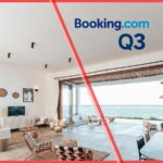Modern waterfront vacation rental interior with ocean view, representing Booking.com’s focus on alternative accommodations in Q3 2025.
