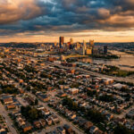 Aerial view of residential neighbourhoods representing short-term rental regulation 2026 developments across Indiana, Pennsylvania, and Montréal