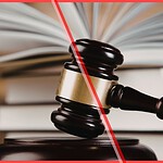 A judge's gavel and stack of law books, symbolizing court rulings central to this week's short-term rental regulation news.