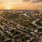 Aerial view of Houston and Washington DC residential neighbourhoods and skylines at golden hour — short-term rental regulations 2026