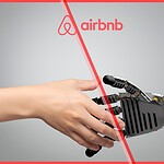 A human hand and a robotic hand reaching toward each other under the Airbnb logo, illustrating the new Airbnb AI strategy.