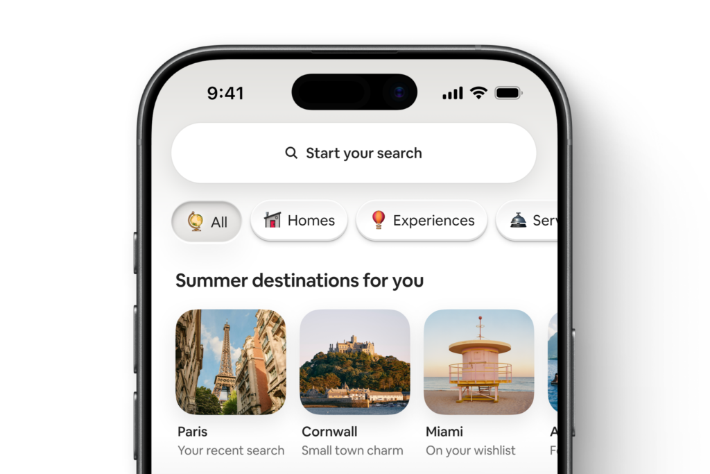 Airbnb Just Made AI Judge, Jury, and Sales Agent: Inside the Summer 2026 Release 3 Airbnb app homepage showing AI-personalized summer destinations — Paris, Cornwall, and Miami — with tabs for Homes, Experiences, and Services after the 2026 Summer Release