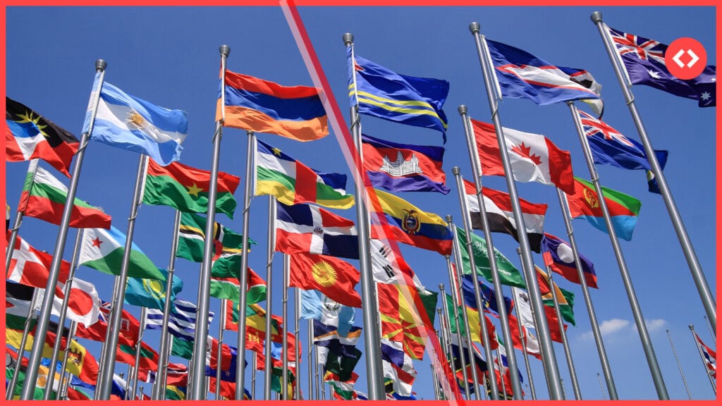 Flags of competing nations flying together ahead of the Commonwealth Games 2026, which is driving demand in Glasgow's short-term rentals market