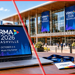 Laptop showing the VRMA 2026 dates, October 4-6, with a conference banner on a Nashville convention centre behind